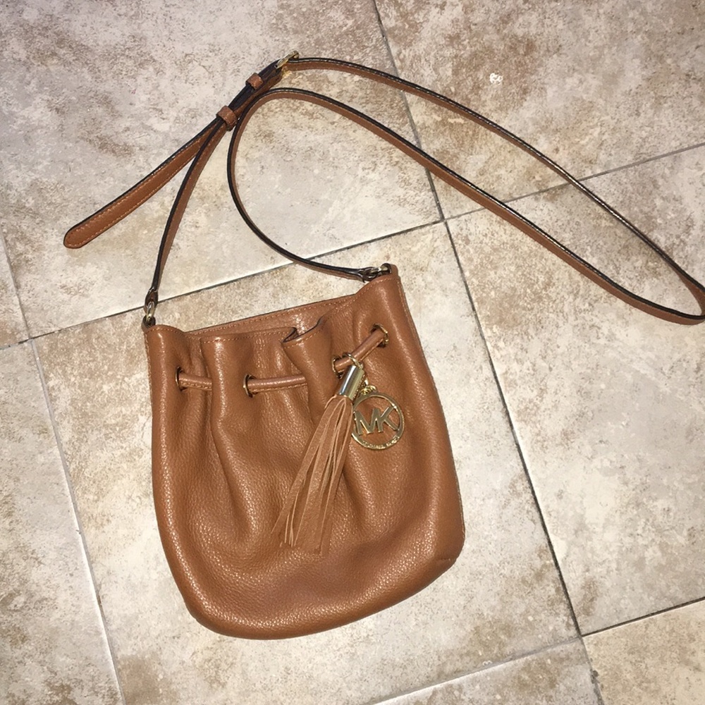 Like new. Michael Kores- Crossbody bag